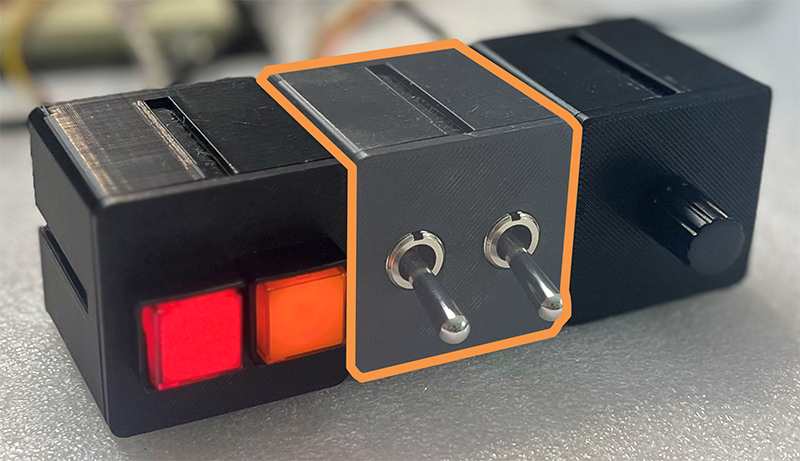 Photo of the beginner project with the two toggle switches highlighted.